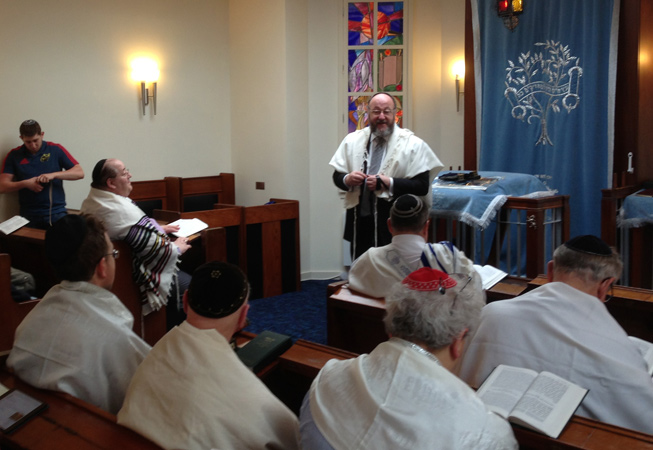 The Chief Rabbi at shacharit in Edinburgh Synagogue