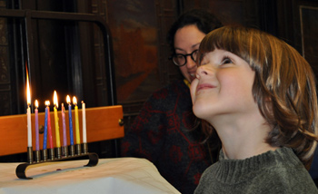 Lighting the chanukiah at SCoJeC's Chanukah party in Stirling